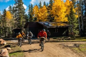 Bike riders at Aquarius Trail Hut System hut